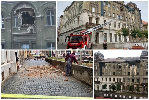 Bucăți dintr-o clădire din Piața Sf. Gheorghe, prăbușite pe trotuar FOTO